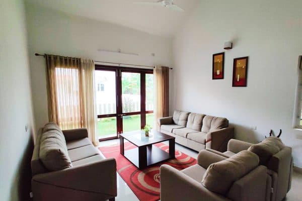 Furnished living room inside a Felycity Riverine villa, Aluva, Kerala