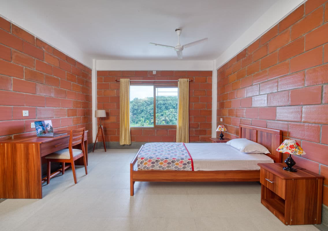 Apartment bedroom with garden view at Rahel Homes, Kolenchery, Kerala
